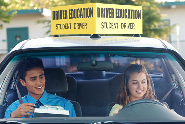 Student and instructor in driver education car