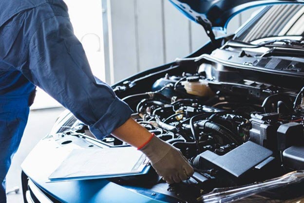 Man servicing car